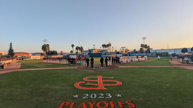 The San Jose Giants (SF Giants Single-A affiliate) and Modesto Nuts stand on the field prior to Game 2 of the California League  Playoffs on September 15, 2023.